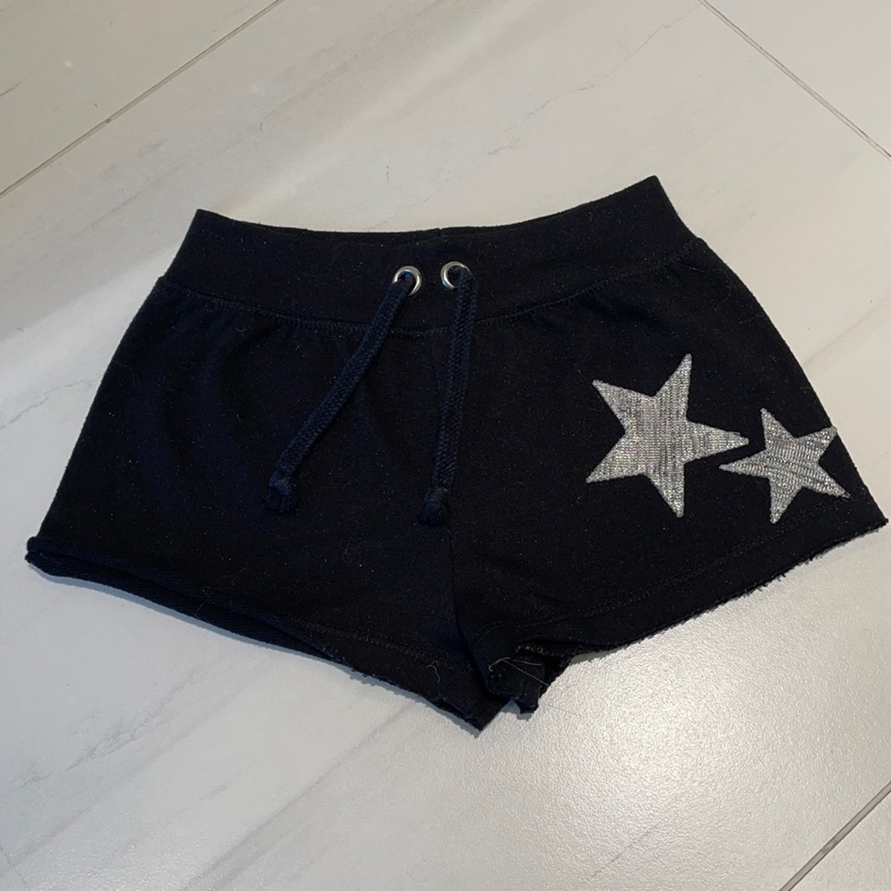 LIKE NEW GIRLS SHORTS WITH STAR DETAIL AND SPARKLE